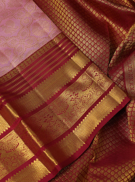 Pure kanchipuram silk saree pastel peach and maroon with allover zari woven brocade weaves and rich zari woven border
