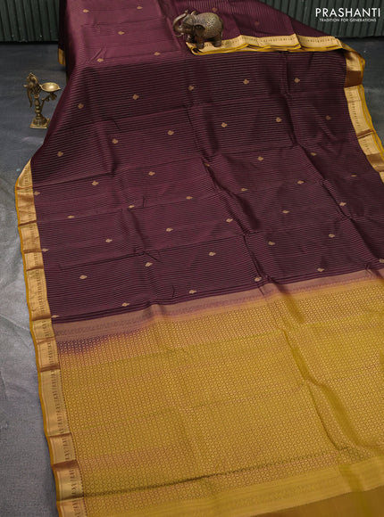 Kanchipuram silk saree coffee brown and mustard yellow with allover zari stripe & buttas and small zari woven border