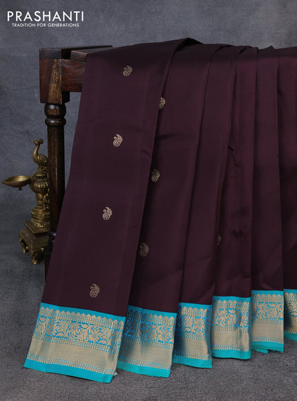 Kanchipuram silk saree deep wine  and dual shade of bluish green with zari woven buttas and zari woven korvai border