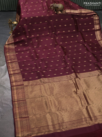 Kanchipuram silk saree wine shade with allover zari woven buttas and zari woven border