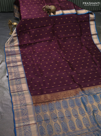 Kanchipuram silk saree deep wine and peacock blue with allover zari woven buttas and long zari woven border
