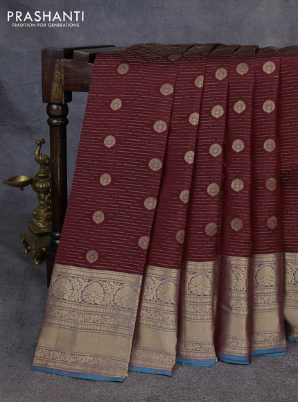 Kanchipuram silk saree deep maroon and teal blue with allover zari woven buttas and long zari woven korvai border