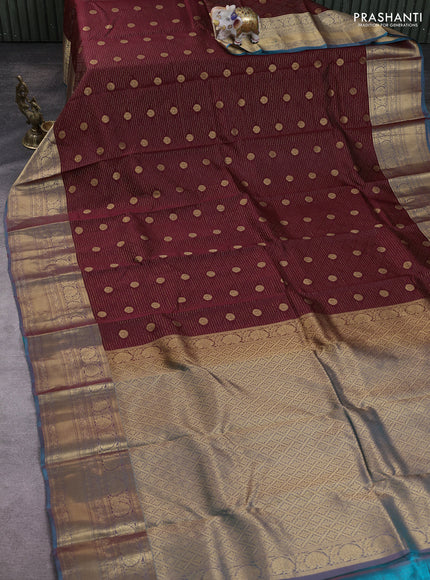 Kanchipuram silk saree deep maroon and teal blue with allover zari woven buttas and long zari woven korvai border