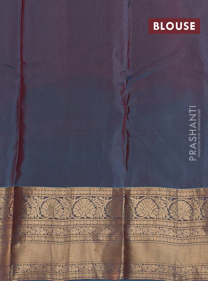 Kanchipuram silk saree deep maroon and teal blue with allover zari woven buttas and long zari woven korvai border