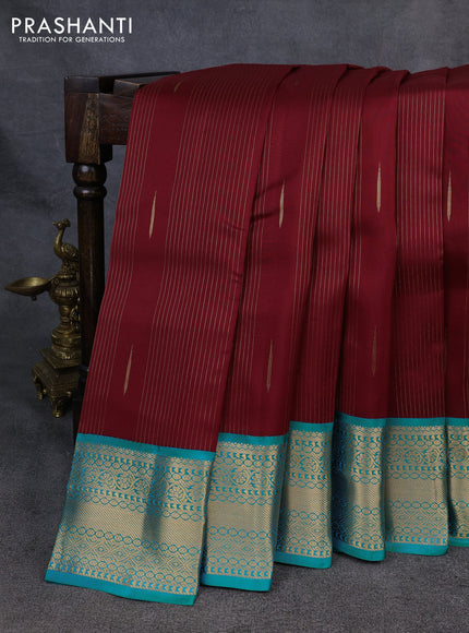 Kanchipuram silk saree deep maroon and teal green with allover zari stripe & buttas and zari woven korvai border