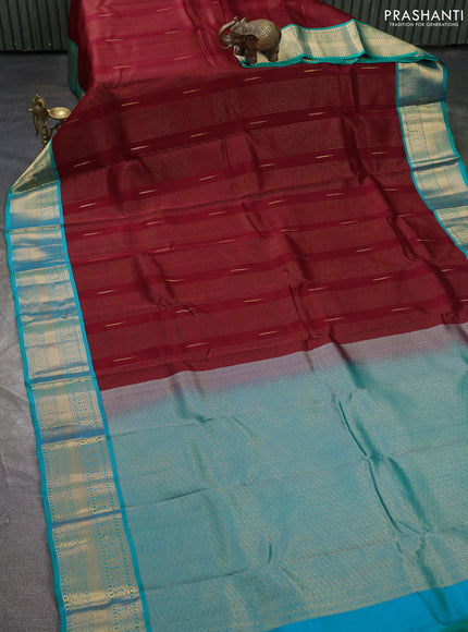 Kanchipuram silk saree deep maroon and teal green with allover zari stripe & buttas and zari woven korvai border