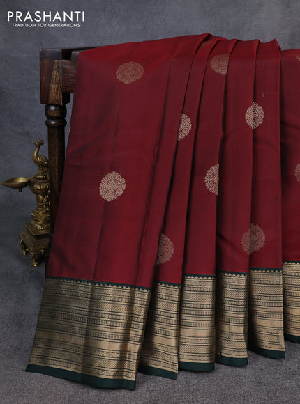 Kanchipuram silk saree deep maroon and bottle green with zari woven buttas and zari woven border