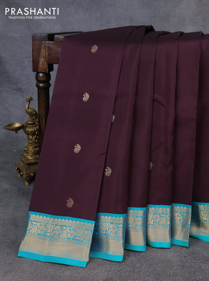 Kanchipuram silk saree deep wine and teal green with zari woven buttas and zari woven korvai border