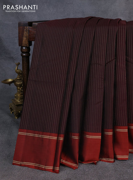 Kanchipuram silk saree coffee brown and orange with allover zari stripe pattern and rettapet zari woven border