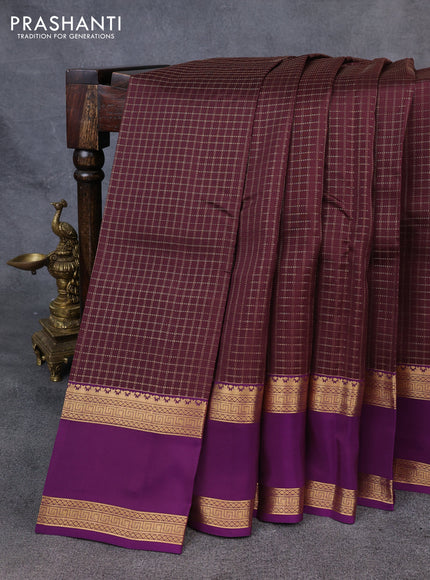 Kanchipuram silk saree deep wine shade and purple with allover zari checked pattern and rettapet zari woven border
