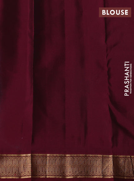 Kanchipuram silk saree peacock green and dark magenta pink with zari woven buttas and zari woven border