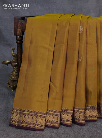 Kanchipuram silk saree mehendi green and coffee brown with zari woven buttas and zari woven border