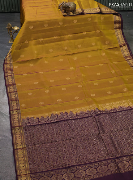 Kanchipuram silk saree mehendi green and coffee brown with zari woven buttas and zari woven border
