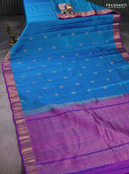 Kanchipuram silk saree dual shade of greenish blue and purple with zari woven buttas and zari woven border