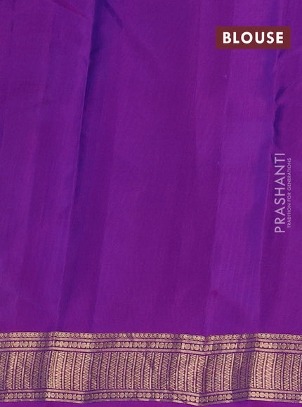 Kanchipuram silk saree dual shade of greenish blue and purple with zari woven buttas and zari woven border