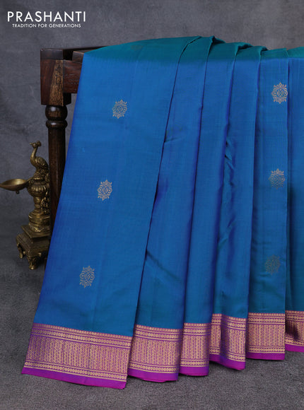 Kanchipuram silk saree dual shade of greenish blue and purple with zari woven buttas and zari woven border