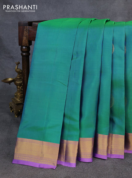 Kanchipuram silk saree dual shade of green and lavender with zari woven buttas and rich zari woven border