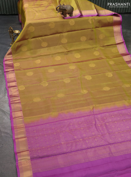 Kanchipuram silk saree mustard green and pink shade with zari woven buttas and rich zari woven border