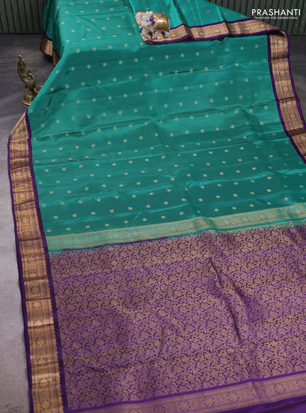 Kanchipuram silk saree green and violet with allover zari woven buttas and zari woven border