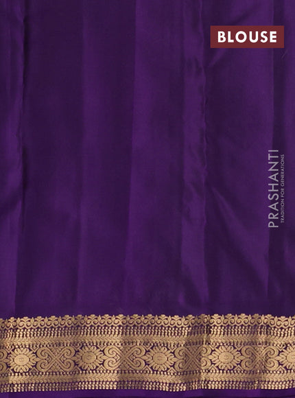 Kanchipuram silk saree green and violet with allover zari woven buttas and zari woven border
