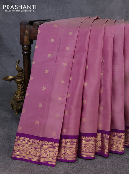 Kanchipuram silk saree pastel purple and purple with allover zari woven buttas and zari woven border