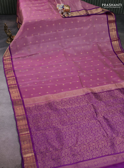 Kanchipuram silk saree pastel purple and purple with allover zari woven buttas and zari woven border