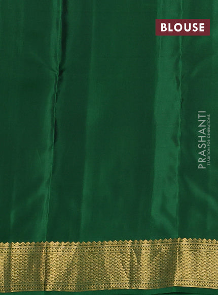 Kanchipuram silk saree navy blue and green with zari woven buttas and zari woven border