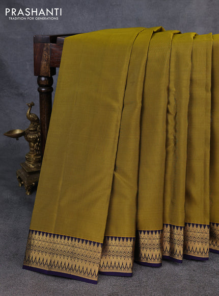 Kanchipuram silk saree mehendi green and navy blue with zari woven buttas and zari woven border