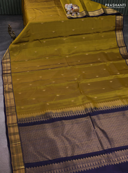 Kanchipuram silk saree mehendi green and navy blue with zari woven buttas and zari woven border