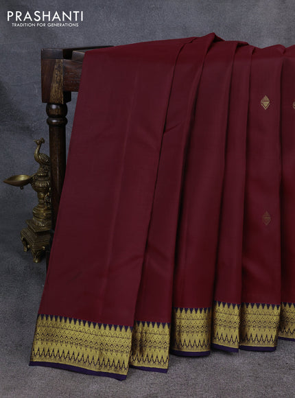 Kanchipuram silk saree deep maroon and navy blue with zari woven buttas and zari woven korvai border