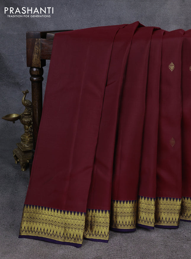 Kanchipuram silk saree deep maroon and navy blue with zari woven buttas and zari woven korvai border
