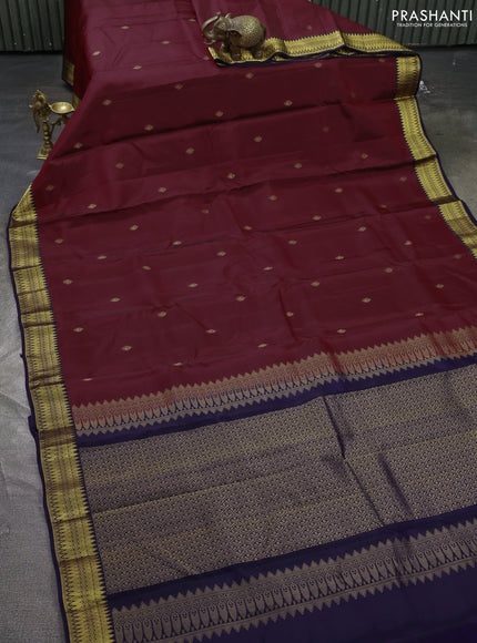 Kanchipuram silk saree deep maroon and navy blue with zari woven buttas and zari woven korvai border
