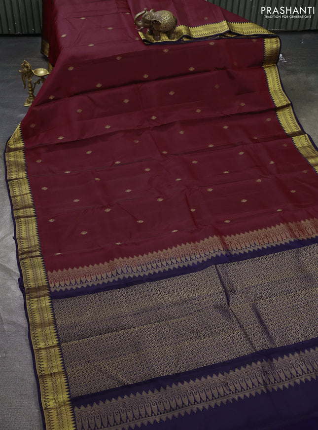 Kanchipuram silk saree deep maroon and navy blue with zari woven buttas and zari woven korvai border