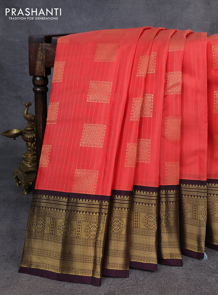 Kanchipuram silk saree orange and wine shade with allover zari stripe & buttas and long zari woven korvai border