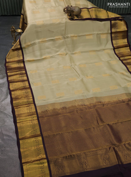 Kanchipuram silk saree elachi green and deep wine with zari woven buttas and long zari woven korvai border