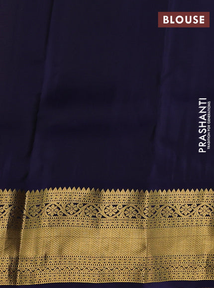 Kanchipuram silk saree pastel pink and navy blue with zari woven buttas and long zari woven korvai border
