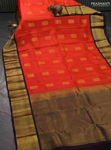 Kanchipuram silk saree orange and deep wine with zari woven buttas and long zari woven korvai border