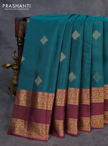 Kanchipuram silk saree peacock green and dark magenta pink with zari woven buttas and zari woven border