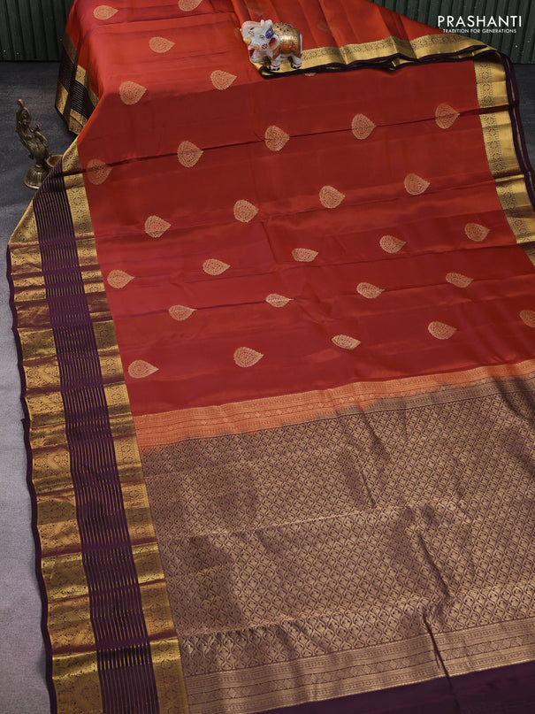 Kanchipuram silk saree rustic orange and wine shade with zari woven buttas and long zari woven border