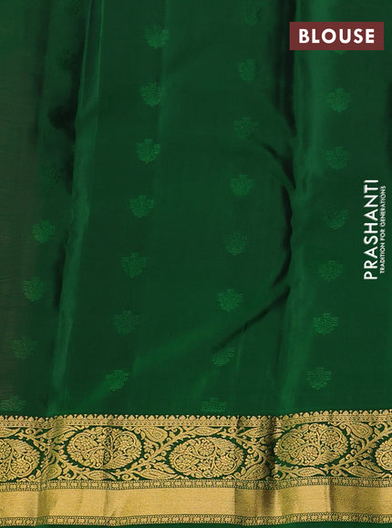 Kanchipuram silk saree wine shade and green with allover zari woven buttas and zari woven korvai border
