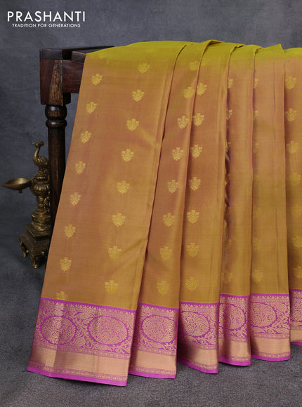 Kanchipuram silk saree mustard green and pink with allover zari woven buttas and zari woven korvai border