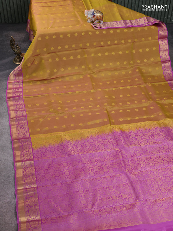 Kanchipuram silk saree mustard green and pink with allover zari woven buttas and zari woven korvai border