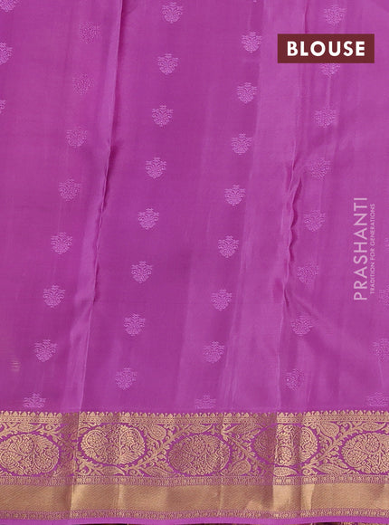 Kanchipuram silk saree mustard green and pink with allover zari woven buttas and zari woven korvai border