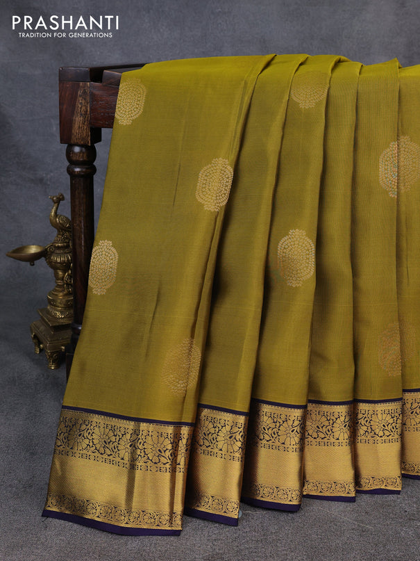 Kanchipuram silk saree dark mahendi green and navy blue with zari woven buttas and zari woven korvai border