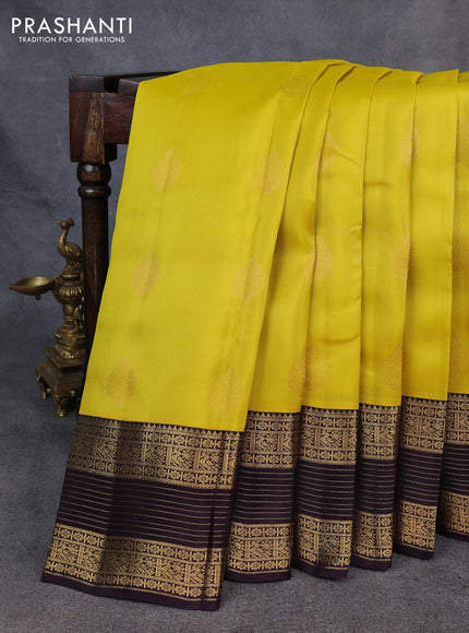 Kanchipuram silk saree yellow and coffee brown with zari woven buttas and long zari woven border
