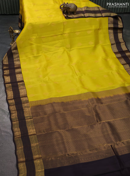 Kanchipuram silk saree yellow and coffee brown with zari woven buttas and long zari woven border