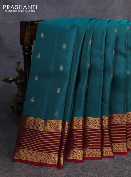 Kanchipuram silk saree teal green and maroon with zari woven buttas and zari woven border