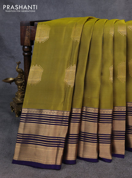 Kanchipuram silk saree mehendi green and navy blue with zari woven buttas and long zari woven border