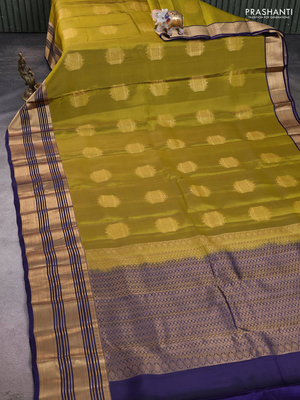 Kanchipuram silk saree mehendi green and navy blue with zari woven buttas and long zari woven border
