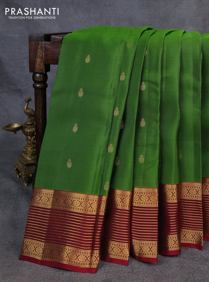 Kanchipuram silk saree green and maroon with allover zari woven buttas and zari woven korvai border